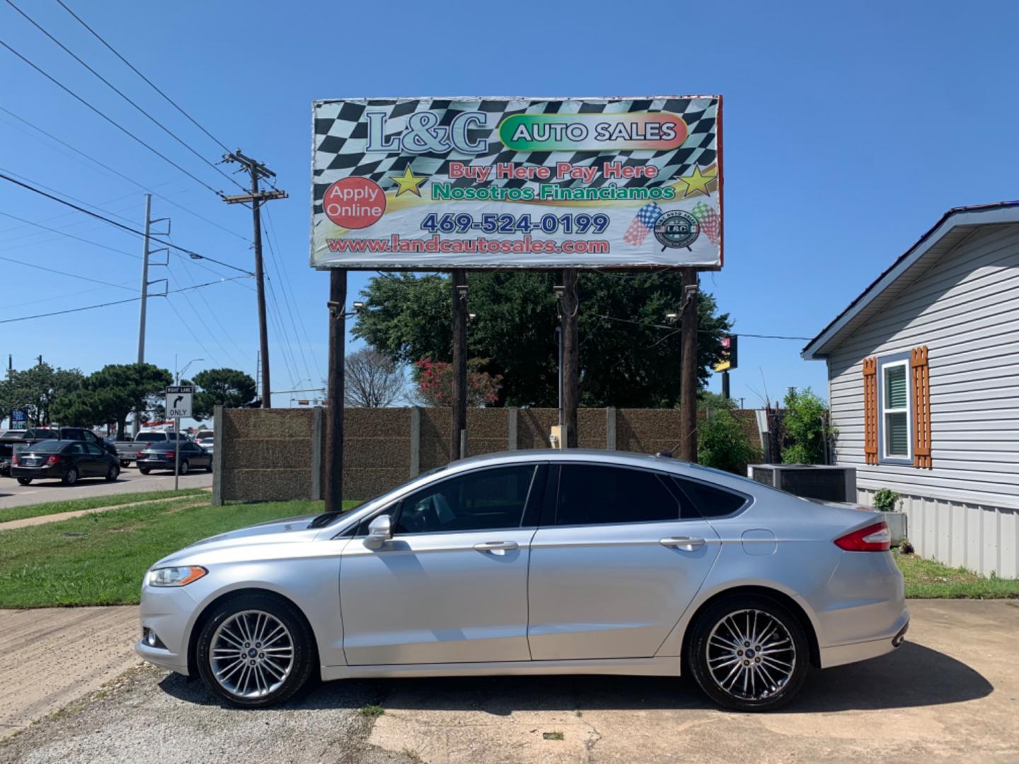 2013 Silver /Black Ford Fusion SE (3FA6P0H99DR) with an 2.0L L4 DOHC 16V engine, AUTOMATIC transmission, located at 1830 North Belt Line Road, Irving, TX, 75061, (469) 524-0199, 32.834373, -96.993584 - Photo#0